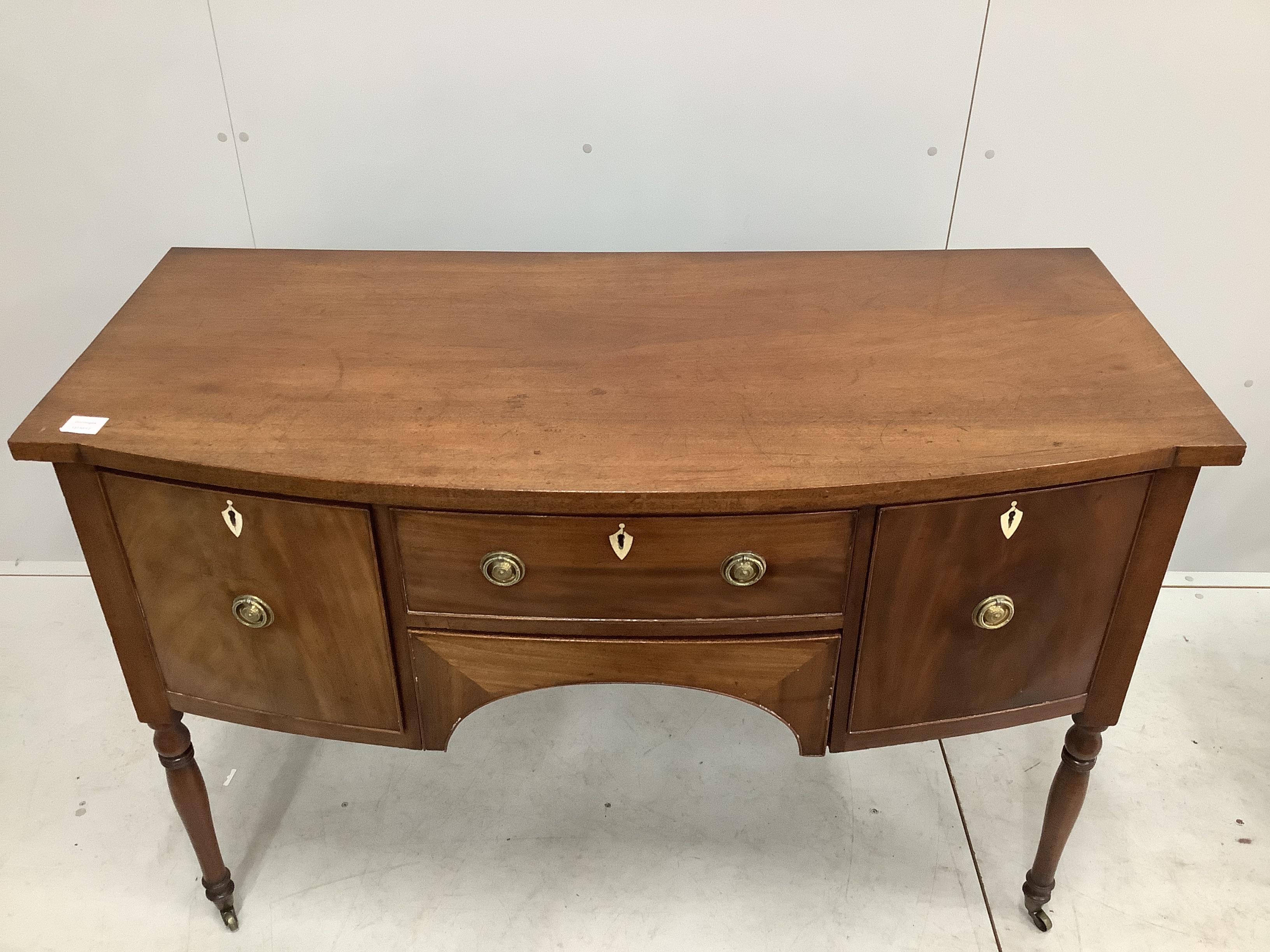 A Regency mahogany bowfront sideboard, width 129cm, depth 58cm, height 88cm